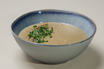 a bowl of creamy mushroom soup. 