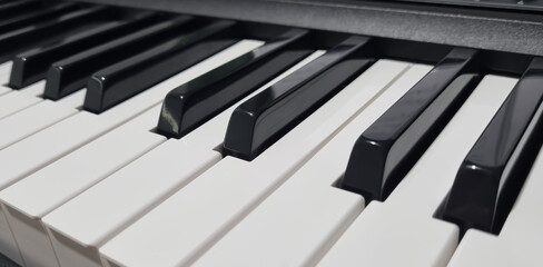 Close-up of traditional black and white piano keys 