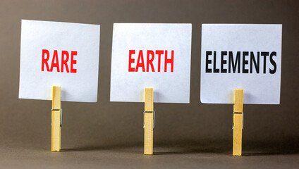 Rare earth elements symbol. Concept words Rare earth elements on beautiful white paper on wooden...