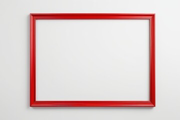a close up of a red frame on a white wall