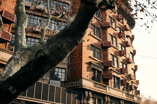 Wukang Mansion in Xuhui District, Shanghai under a clear sky.