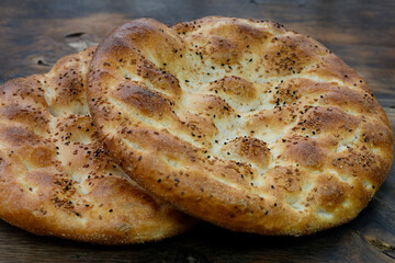 Pide - Turkis pita on rustic wood background