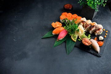 Set of sushi, maki on stone table. Top view with copy space © smspsy