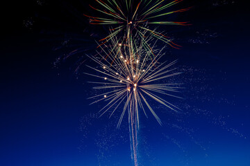 The moment of a firework explosion in the sky. This picture was taken with a long exposure, which captured the beauty and surprising shapes of the festive fireworks.
