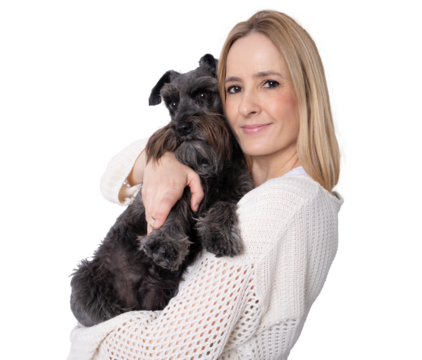 Portrait of a young blond woman hugging her little schnauzer dog standing isolated over transparent background. PNG transparent