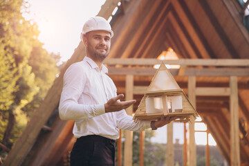 Man builder. Contractor for construction company. Architect in unfinished building. Builder in...