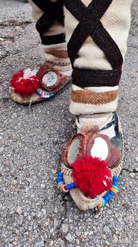 Kukeri costumes and masks with bells in the clothing, dedicated to the annual Kukeri folklore festival in Bulgaria