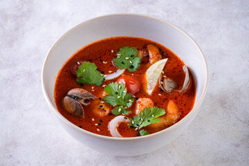 Thai dish tom yam. Traditional spicy soup close-up