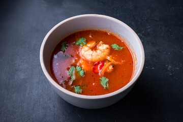 Thai dish tom yam. Traditional spicy soup close-up