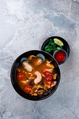 Thai dish tom yam. Traditional spicy soup top view