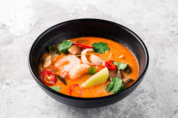 Thai dish tom yam. Traditional spicy soup close-up