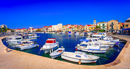 Obraz premium Vodice, Croatia: Sceninc view of the harbor and waterfront, main promenade in the downtown, Adriatic sea coastline, Dalmatia