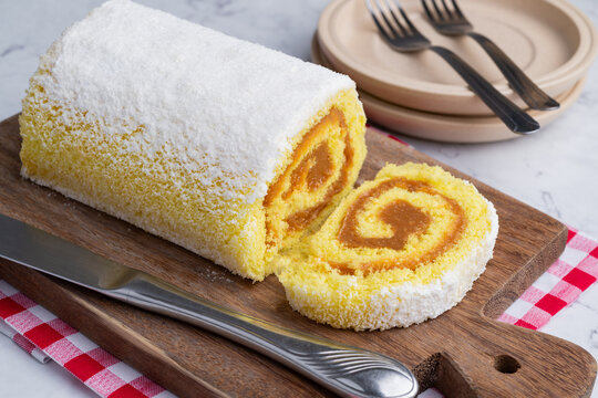 Roll cake or swiss cake filled with dulce de leche