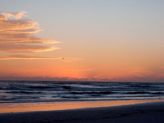 Beautiful sunset over the beach in Florida showcasing vibrant colors reflecting on the water