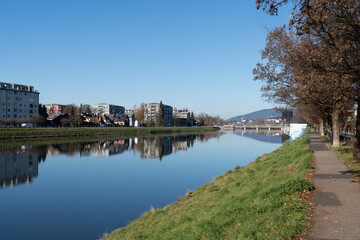 Fototapeta premium Salzach River on a sunny late fall morning in Salzburg Austria