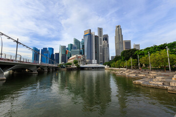 Singapore river with Anderson bridge and skyline panorama with skyscrapers of banks and offices at Marina Bay Financial Centre in the morning