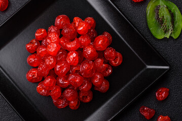 Dried sweet red pitted cherries or candied fruits