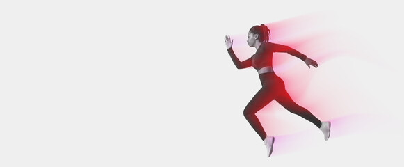 African american woman professional athlete, runner training isolated on neon colored studio background, panorama, copy space, side view. Action, motion, speed, healthy lifestyle