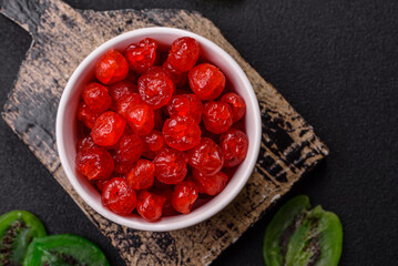 Dried sweet red pitted cherries or candied fruits