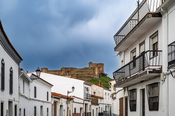 View of Castillo de Montemolin from streets of Montemolin town in Spain