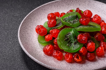 Dried sweet red pitted cherries or candied fruits