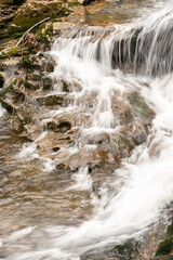 stones and waterfall.