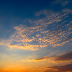 Beautiful sunset with sun and blue sky.