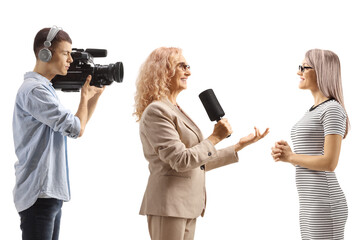 Female reporter interviewing a young woman