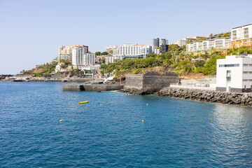 Ancient Coal Pier (Cais do Carvão) in Lido Promenade with natural pools and hotel zone at the...