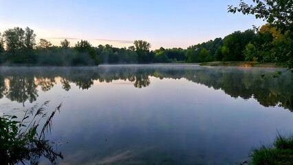 Peaceful morning reflections a calm lake