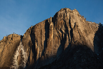 Early morning sun on the mountains, in the nature of Yosemite, California.
