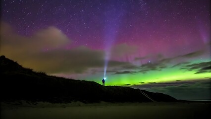 Tourist shines a flashlight incredible starry s