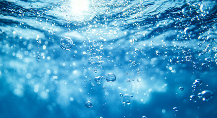 Bubbles fill the water, with sunlight shining through them