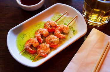 Grilled shrimp skewers. Japanese food. High quality photo