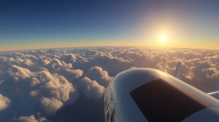 Airplane view of clouds at sunset