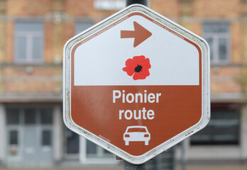 Traffic sign board for the Pioneer Route, a thematic World War One remembrance circuit in West Flanders, Belgium. Selective focus