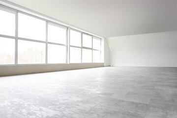 View of big empty room with large window