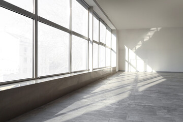 View of big empty room with large window