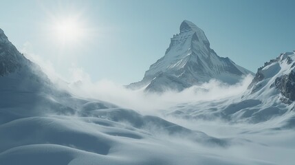 Majestic snow-capped mountain peak shrouded in mist, sunlit.