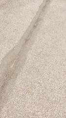 Crack forming on asphalt road surface in cesky krumlov