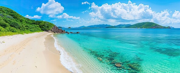 The sand spit of a tropical island disappears into the distance. A stunning summer landscape with a cheerful sun on a white sand beach