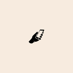 Mobile phone in hand icon flat vector design.