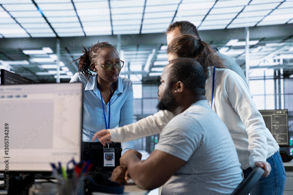 Poster system admins doing brainstorming in computer network security data center workplace, ensuring optim
