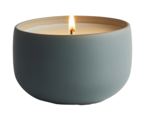 Aromatic candle with blue ceramic holder and bright flame, soothing ambiance concept