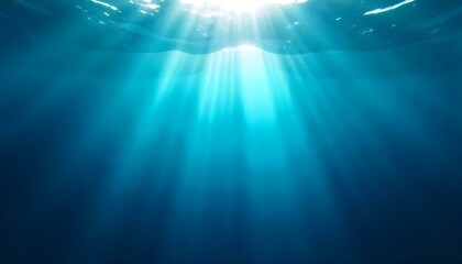 Obraz premium Underwater scene with sun rays penetrating through the water, creating a play of light and shadow