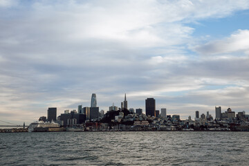 Scenic View of San Francisco Bay, Shell, Golden Gate Bridge, and Pier on a late afternoon