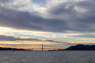 Scenic View of San Francisco Bay, Shell, Golden Gate Bridge, and Pier on a late afternoon
