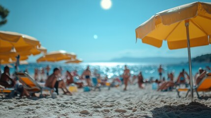 Crowded beach scene with people relaxing under colorful umbrellas.