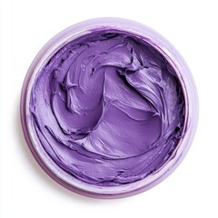 The lavender-colored cream, perhaps a face mask or hair treatment, fills round container, and thick swirls suggest luscious texture ready to offer moisture.