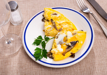 Scramble fried eggs omelet with mushrooms as menu concept healthy eating, top view.